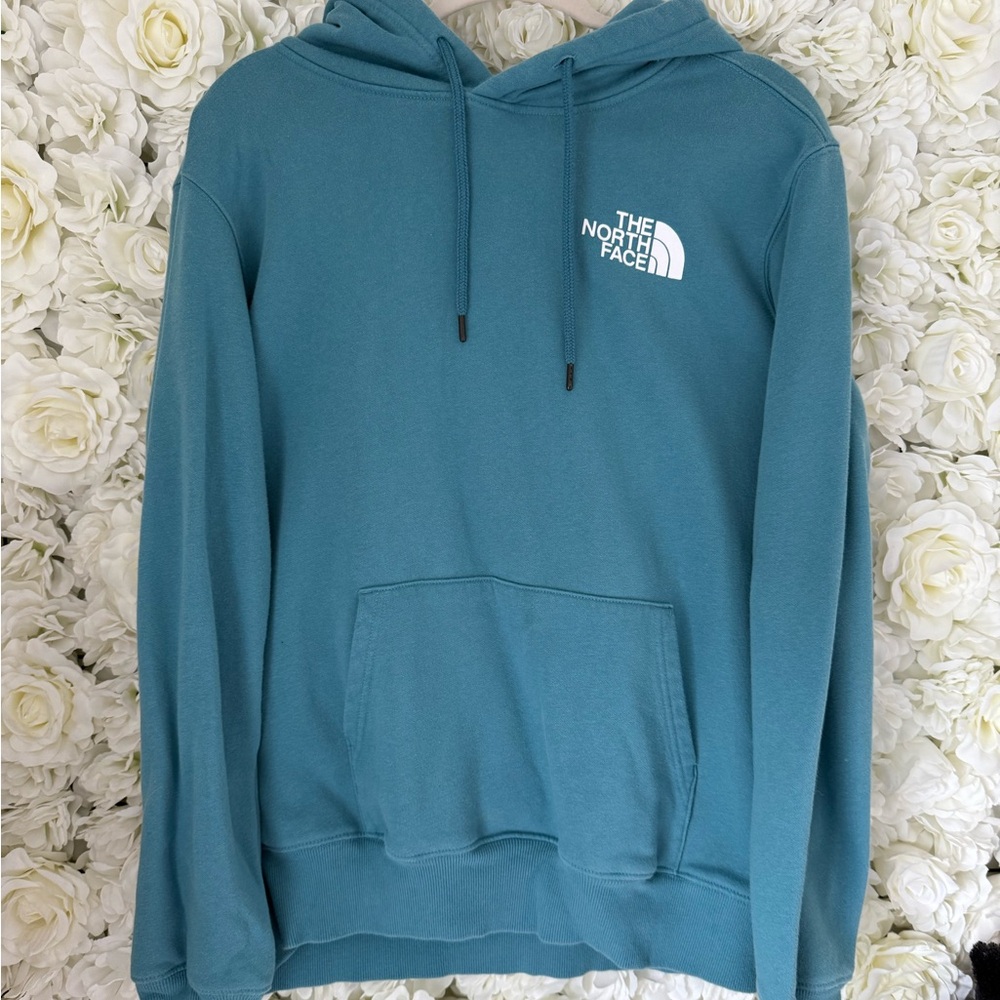 The North Face Blue Hoodie with Relaxed Fit and Ribbed Cuffs